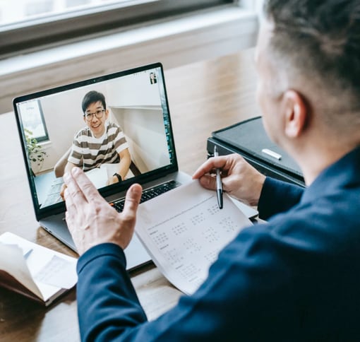 man and woman in video call